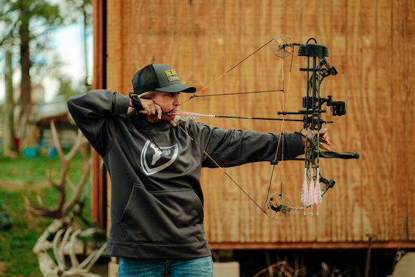 Michele Eichler shooting Bear Archery Legit Bow