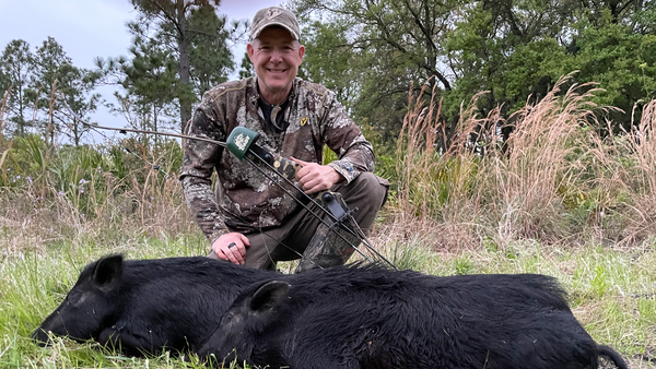 Fred Eichler with Hog shot by a Bear Recurve bow