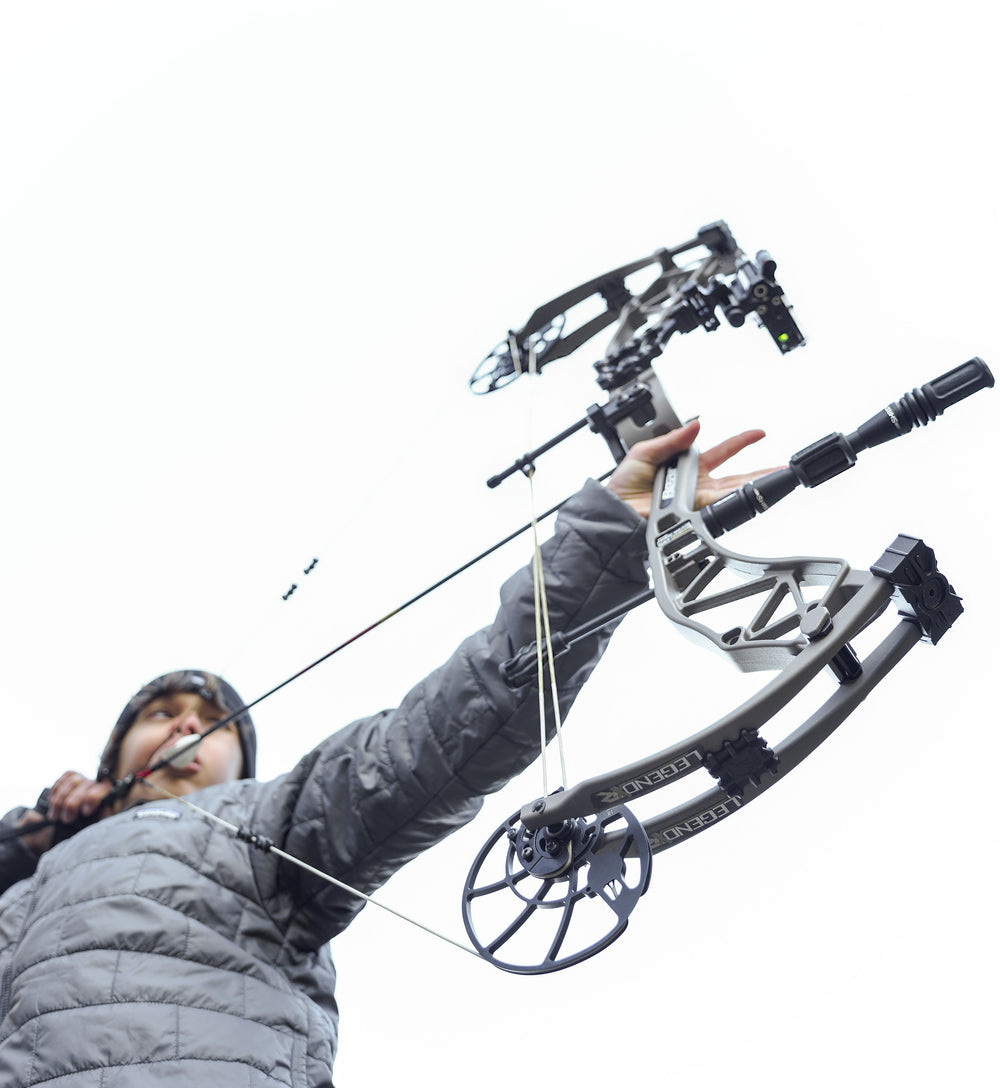 Guy Shooting Bear Archery Legend XR Compound Bow