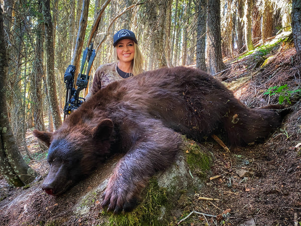 Kristy Titus with Bear killed with Bear Archery Compound Bow